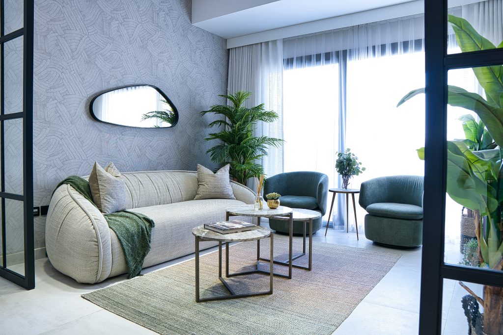 Modern furnished Dubai apartment living room used to compare short-term and long-term rental returns