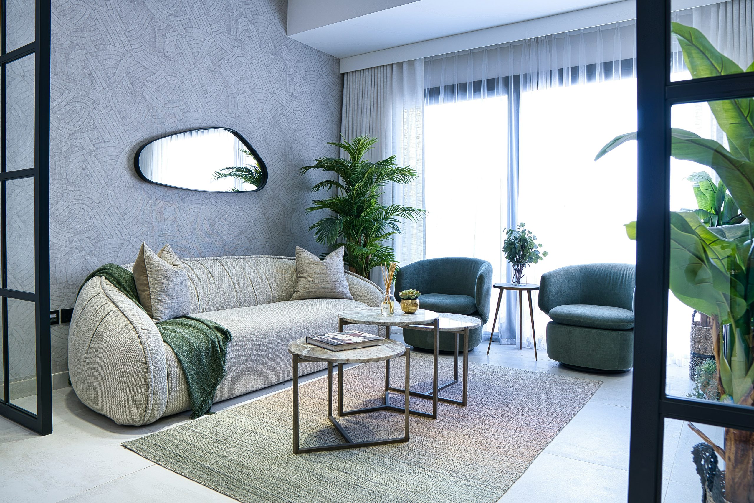 Modern furnished Dubai apartment living room used to compare short-term and long-term rental returns