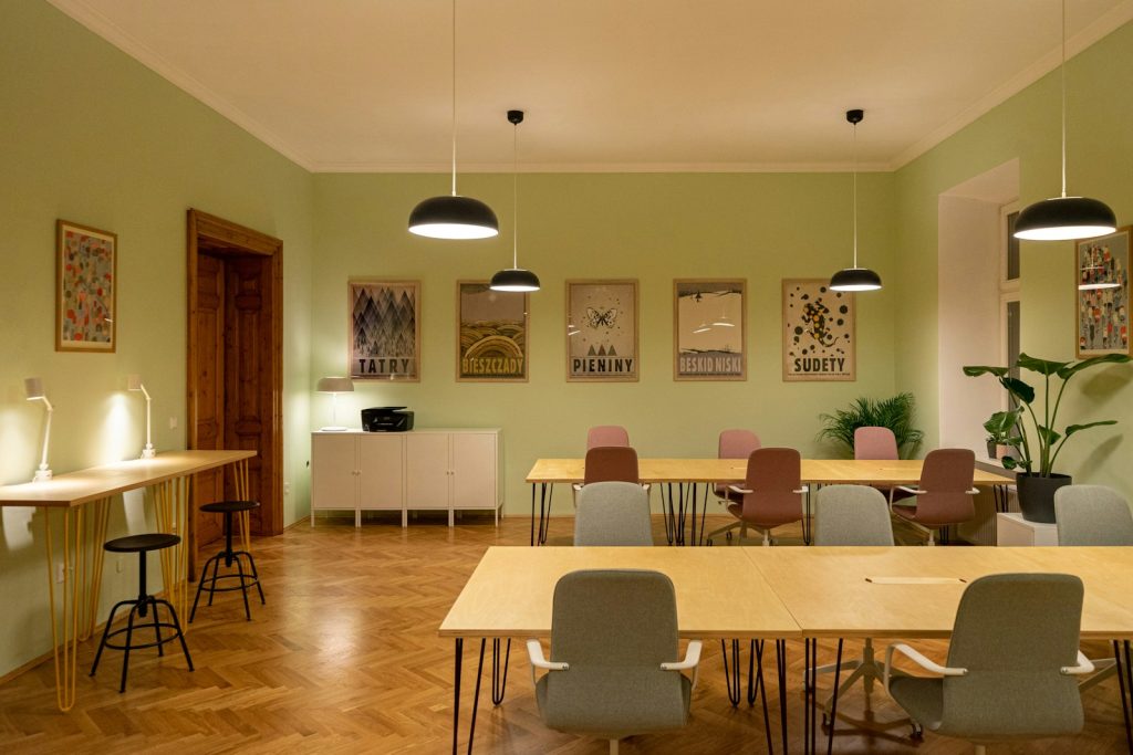 Modern shared coworking office workspace representing a Dubai flexi-desk versus virtual office
