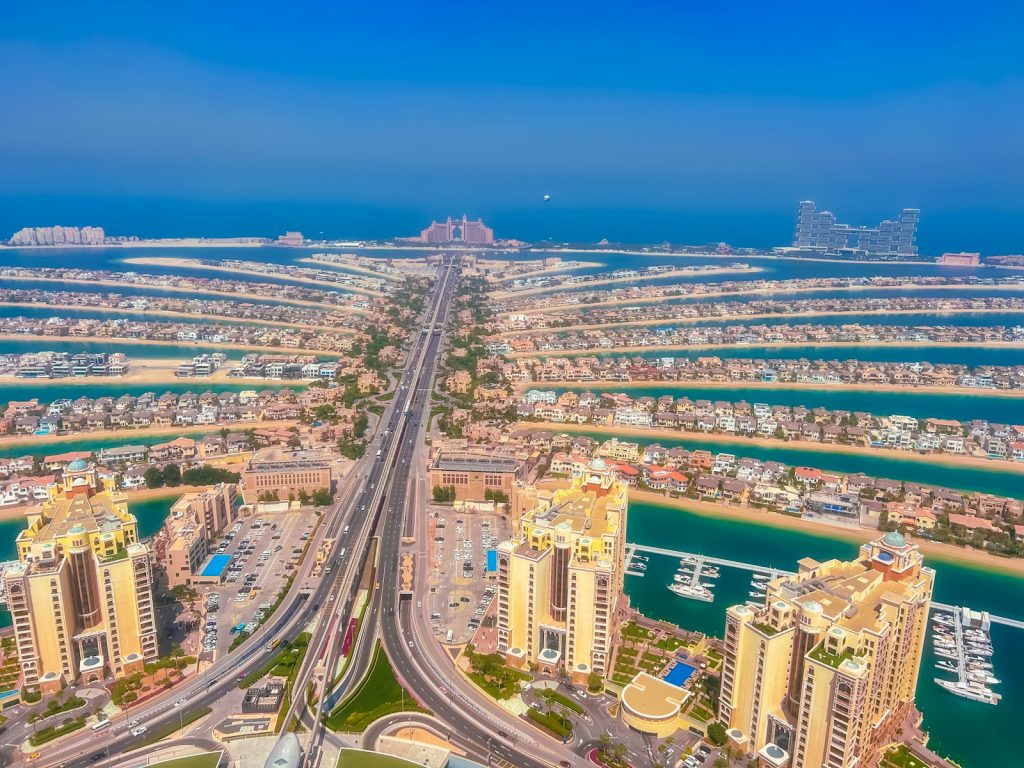 Aerial view of Palm Jumeirah in Dubai, illustrating selling Dubai property from overseas via power of attorney