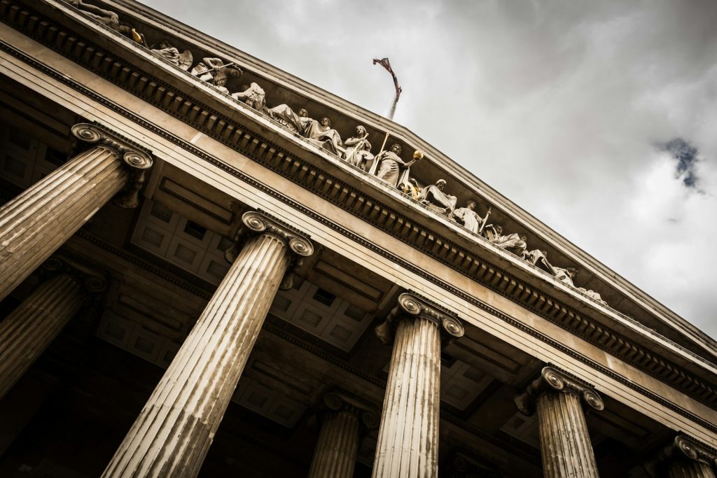 Neoclassical courthouse columns representing UAE court fees and judicial costs