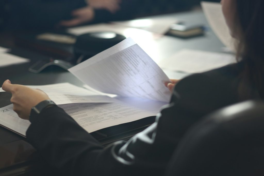 Legal documents being reviewed at a desk, illustrating a UAE prejudgment attachment application