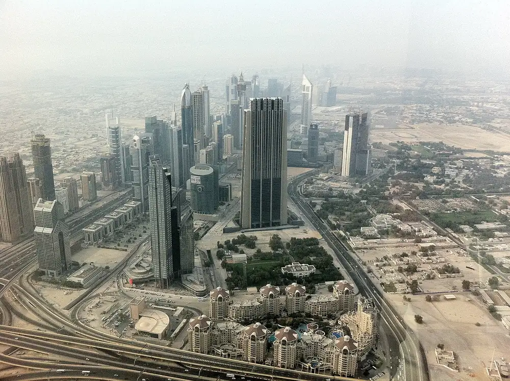 Aerial view of Downtown Dubai towers and Sheikh Zayed Road seen from Burj Khalifa