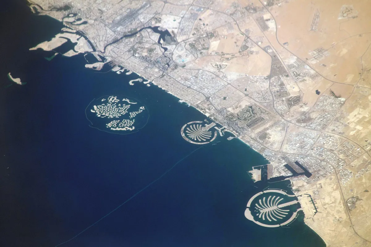 Satellite view of The World Islands, Palm Jumeirah and Palm Jebel Ali off the Dubai coastline